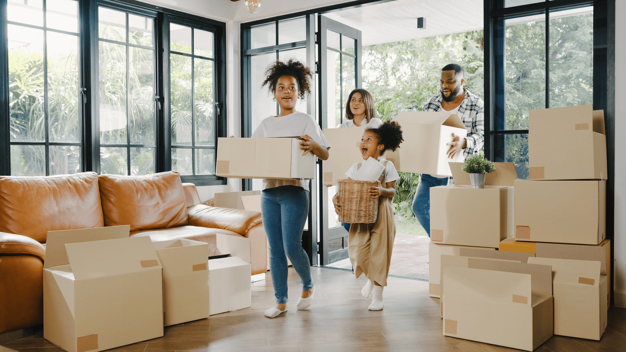 Happy family moving into new home